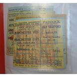 An album of Manchester United football programmes and ticket stubs,