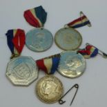 Five commemorative medallions