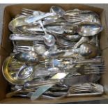 A collection of plated flatware