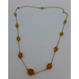 A 9ct gold and faceted bead necklace