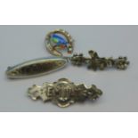 Four silver brooches including Emily and Baby named brooches and an enamelled bird hallmarked