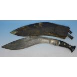 An Indian Kukri with scabbard and two miniature knives