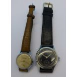 A Mildia black dial wristwatch and a lady's Ingersoll wristwatch