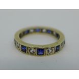 A 9ct gold, blue and white stone eternity ring, lacking one stone, 2.