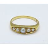 An 18ct gold and pearl ring, 3.