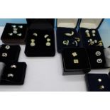 Nineteen pairs of costume earrings