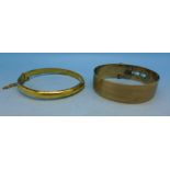 A rolled gold bangle and a 9ct gold and silver bangle