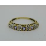 A 9ct gold, tanzanite and diamond ring, 1.