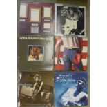 A collection of fourteen LP records, Abba,