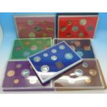 Seven coin sets, the Coinage of Great Britain and Northern Ireland, 1974 to 1976,