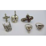 Six silver Gothic style rings including 925 silver