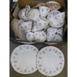 A Royal Osborne tea set, twenty-nine pieces, twelve cups, eleven saucers, tea plates, etc.