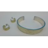 A silver Tiffany bangle and a pair of 925 silver earrings