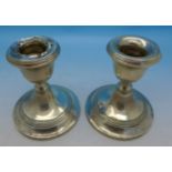 A pair of silver candlesticks, 8cm,