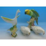 Five bird figures; two Beswick (parrot a/f),