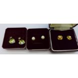 A pair of 9ct gold and pearl earrings and two other pairs of earrings