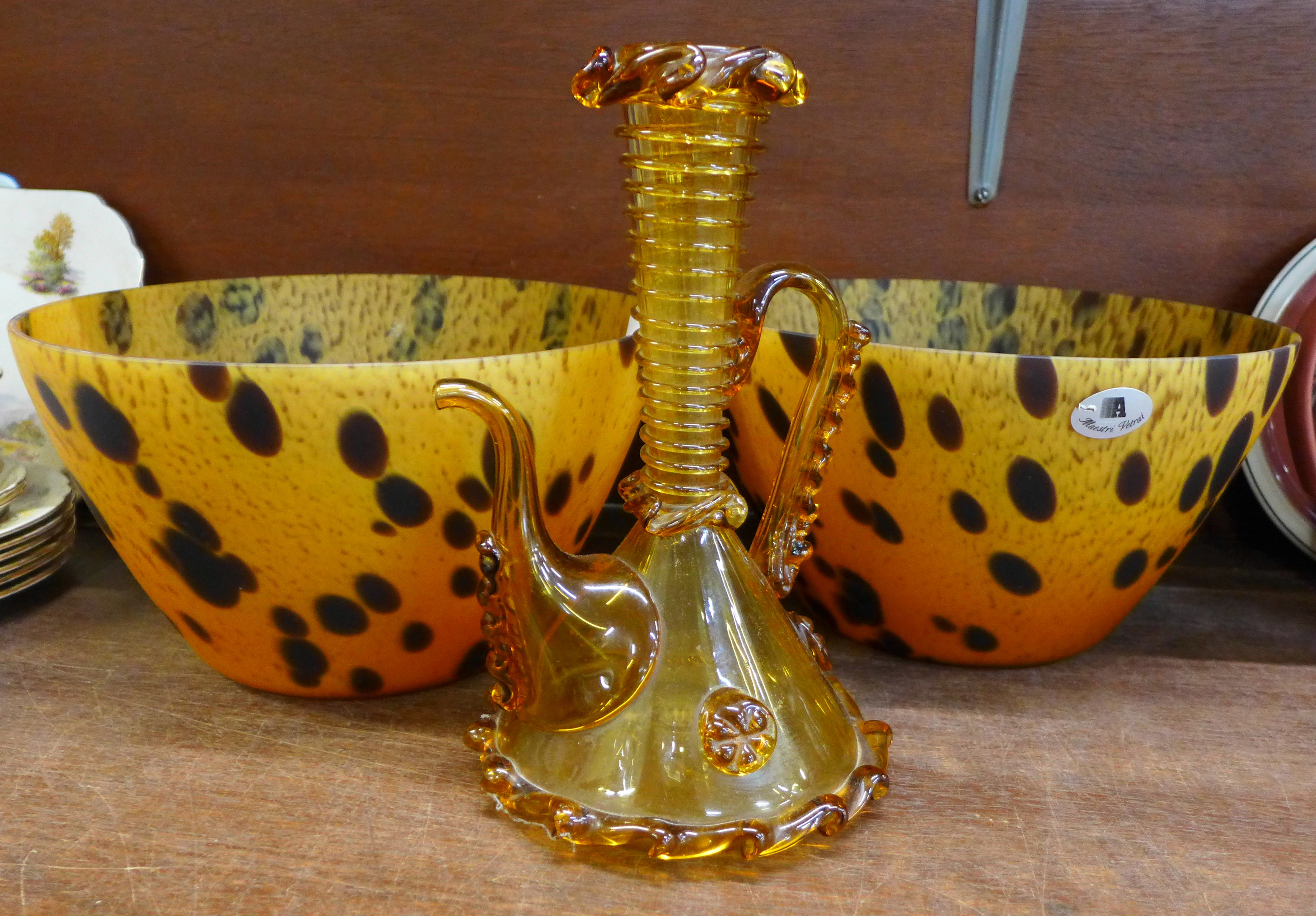 A pair of Maestr Vetrai tortoiseshell pattern glass vases and an amber glass jug (3)