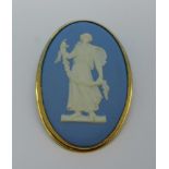 A 9ct gold mounted Wedgwood Jasperware brooch,