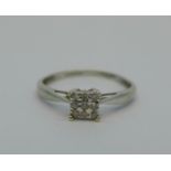 A 9ct white gold and nine stone diamond ring, 1.