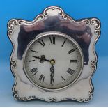 A silver fronted clock