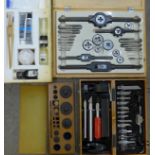 A clock dial repair kit, a set of craft knives and blade attachments,