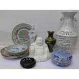 Oriental items including plates, a Buddha, a cloisonne vase, a table lamp,
