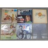 Seven LP records, including The Ventures, Neil Young,