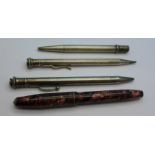 Three propelling pencils including two silver and a Conway Stewart ink pen with 14ct gold nib