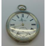 A silver pocket watch,