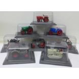 A collection of model farm vehicles