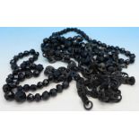 Two faceted jet bead necklaces,