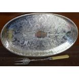 A silver plated on copper tray and a toasting fork with silver ferrule