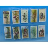 A collection of cigarette cards, mixed brands, including Players,