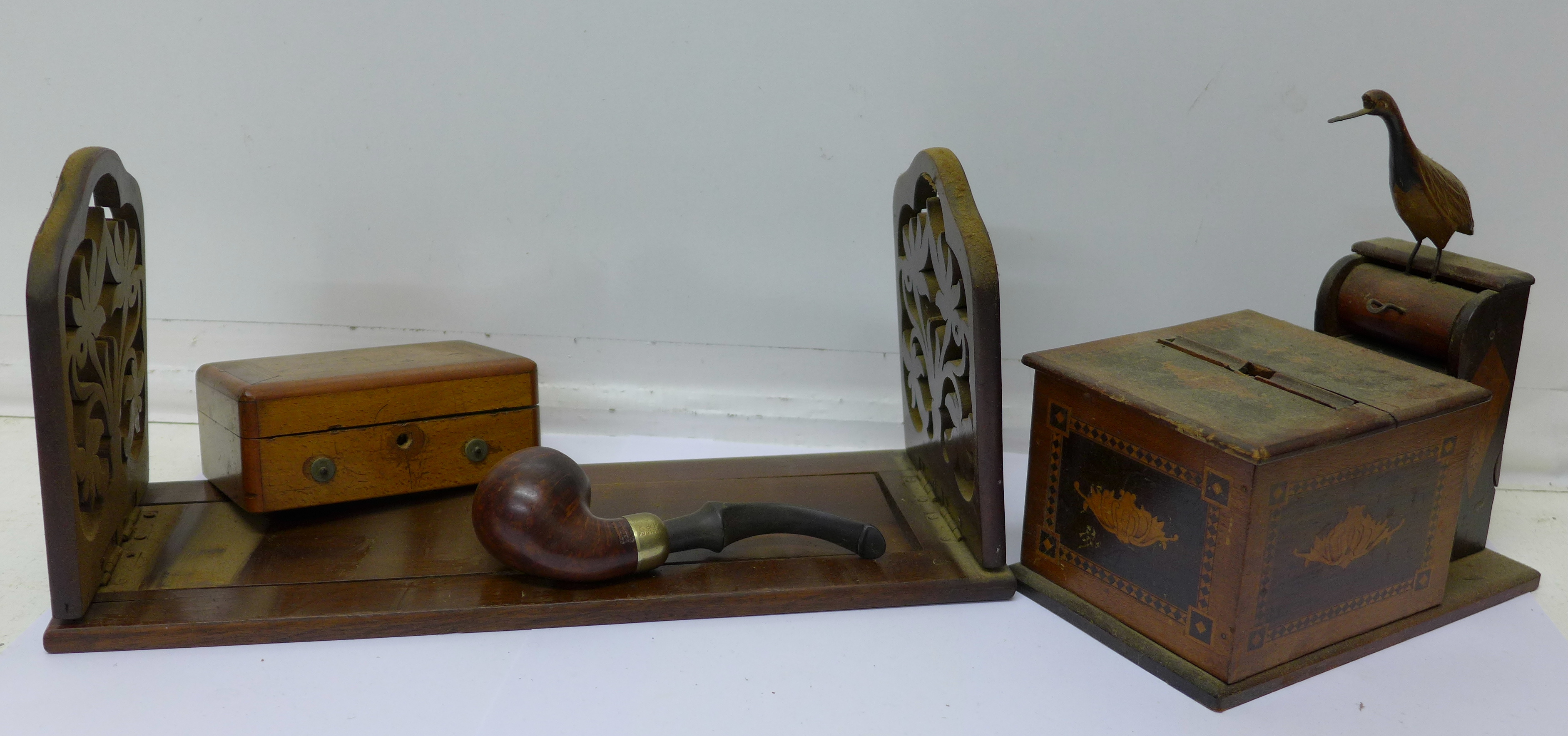 A novelty cigarette dispenser, an inlaid box with musical movement and key,