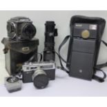 A Russian Kev 120 medium format camera, a Yashica Electro 35 Range finder camera,