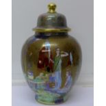 A Wilton Ware lustre vase and cover, decorated with two ladies,