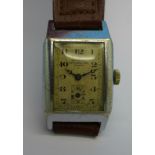 A rectangular cased wristwatch, the dial marked Aeroplane, G & M Lane & Co. Ltd.