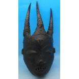 African tribal souvenir; a carved Pende Passport mask,