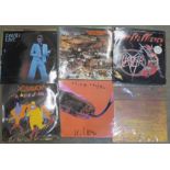 Nine LP records, including Barclay James Harvest, Black Sabbath,