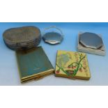 Five compacts including reptile skin and Vogue