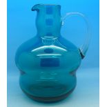 A blue glass jug,