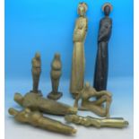 Six abstract statuettes or trial pieces and two other figures, tallest 23.