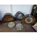 Three oak mantel clocks