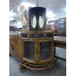 A Victorian bamboo chinoiserie decorated bow front corner cabinet