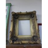 A gilt picture frame