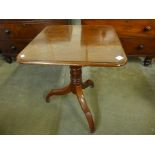 A Victorian mahogany square top tripod table