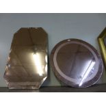 Two peach glass mirrors