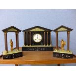A 19th Century French Belge noir and onyx clock garniture