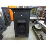 An Edward VII cast iron bedroom fireplace