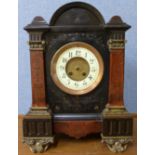 A 19th Century French Belge noir and rouge marble mantel clock